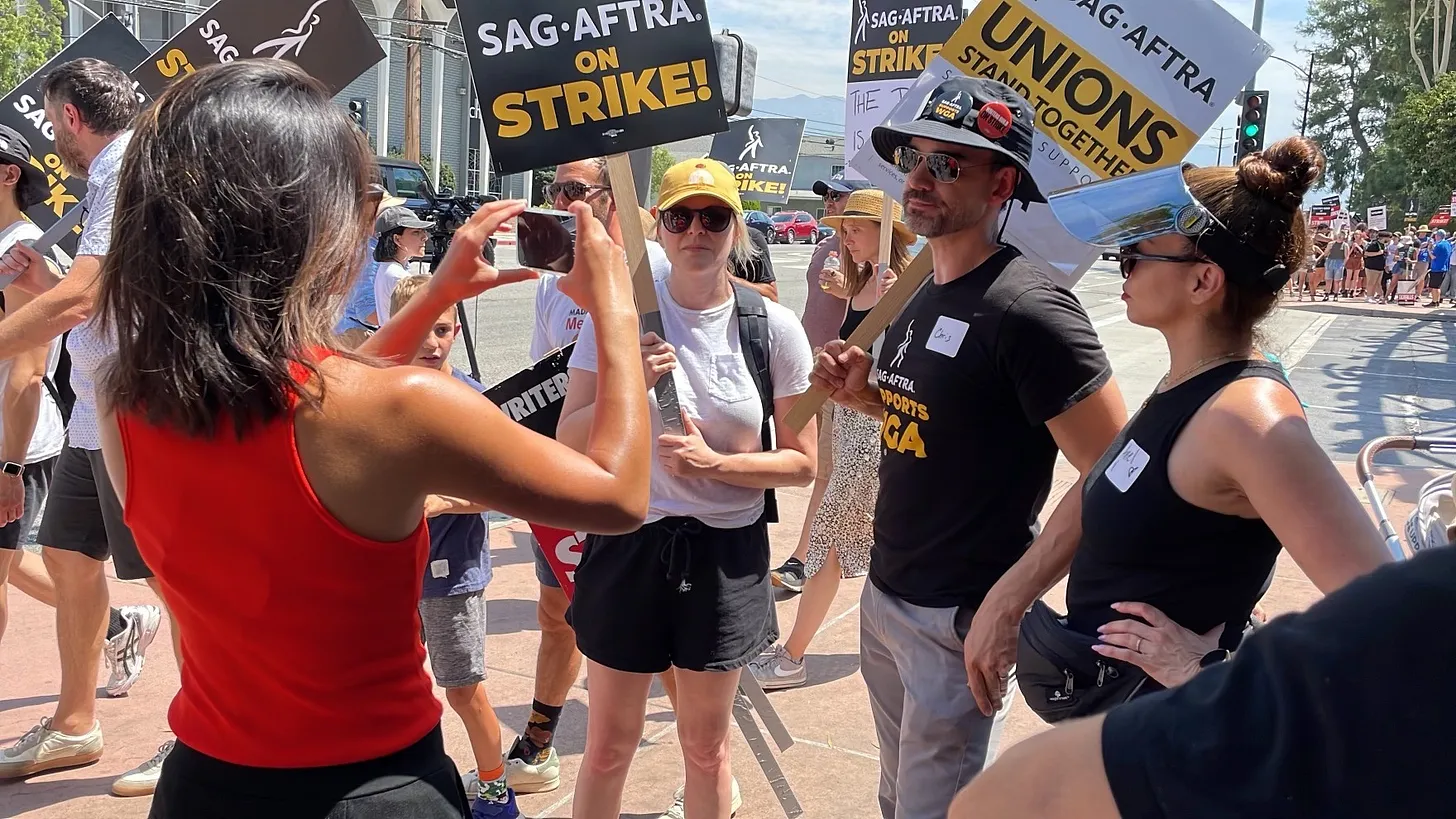 Heat Is On: Actors, Writers Erupt Outside Hollywood Studios