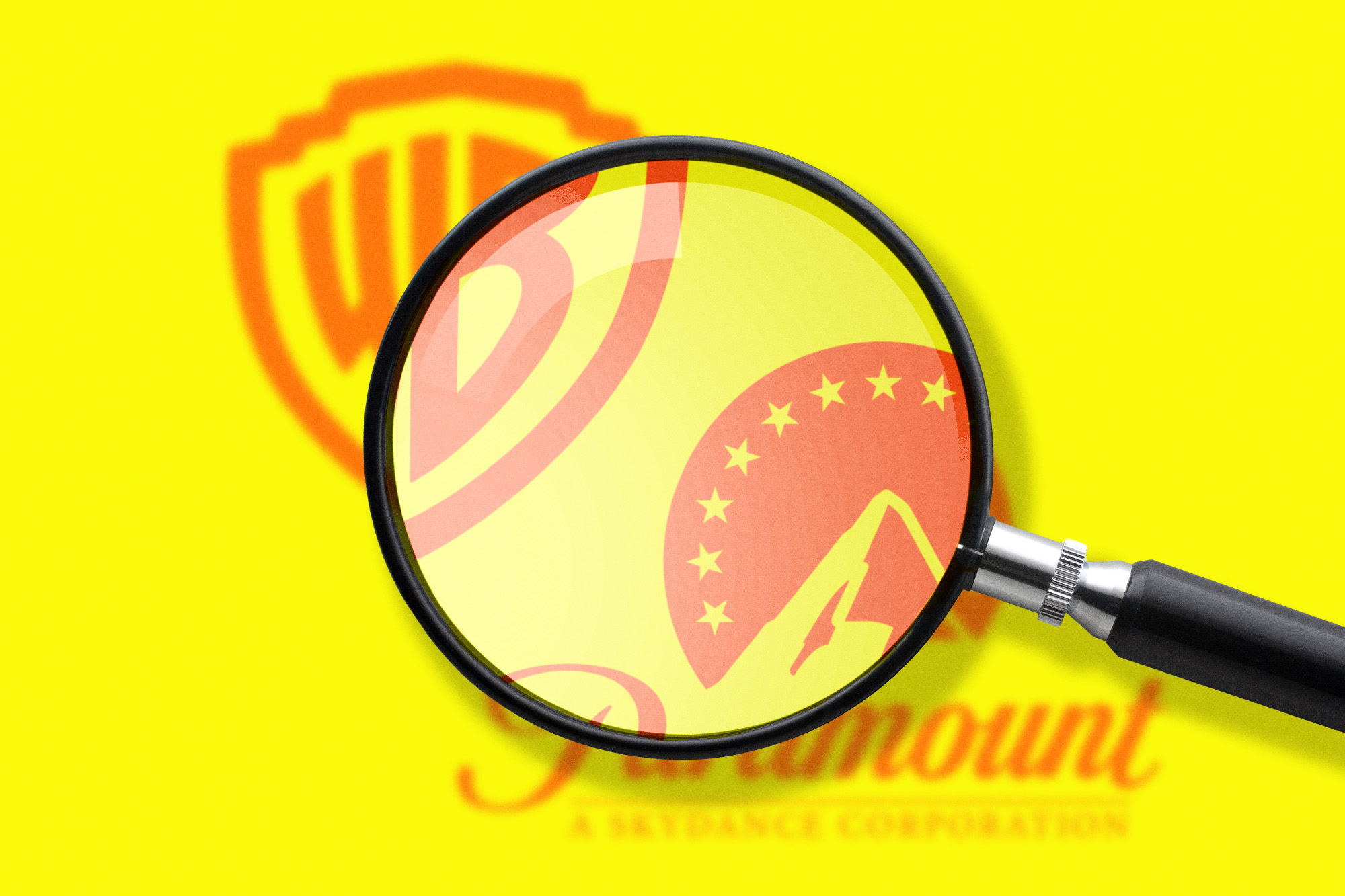 A magnifying glass held over the Warner Bros. and Paramount logos