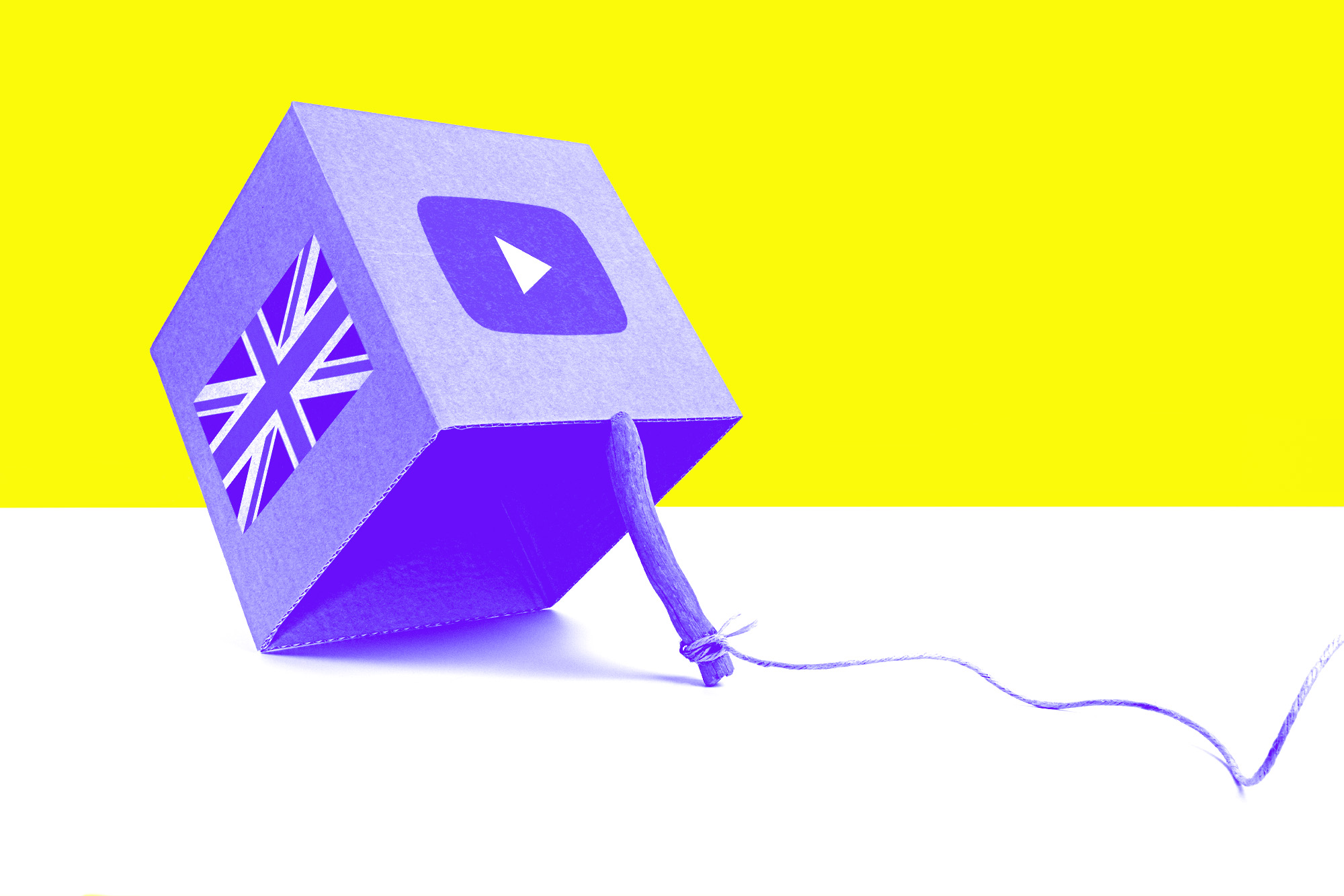 stick-and-box trap with the YouTube logo on one side of the box and the UK flag on another side of the box