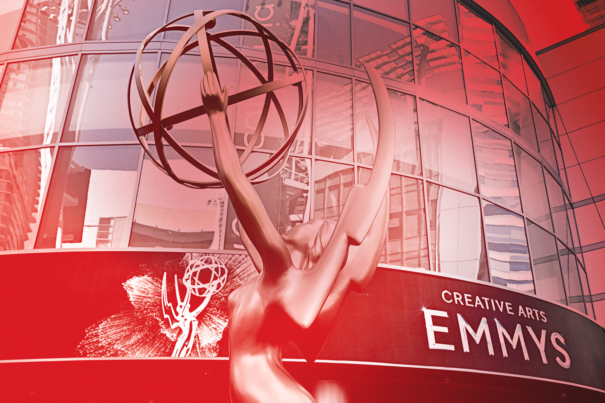 Emmy statue in front of the Peacock Theater with a sign that reads "CREATIVE ARTS EMMYS"